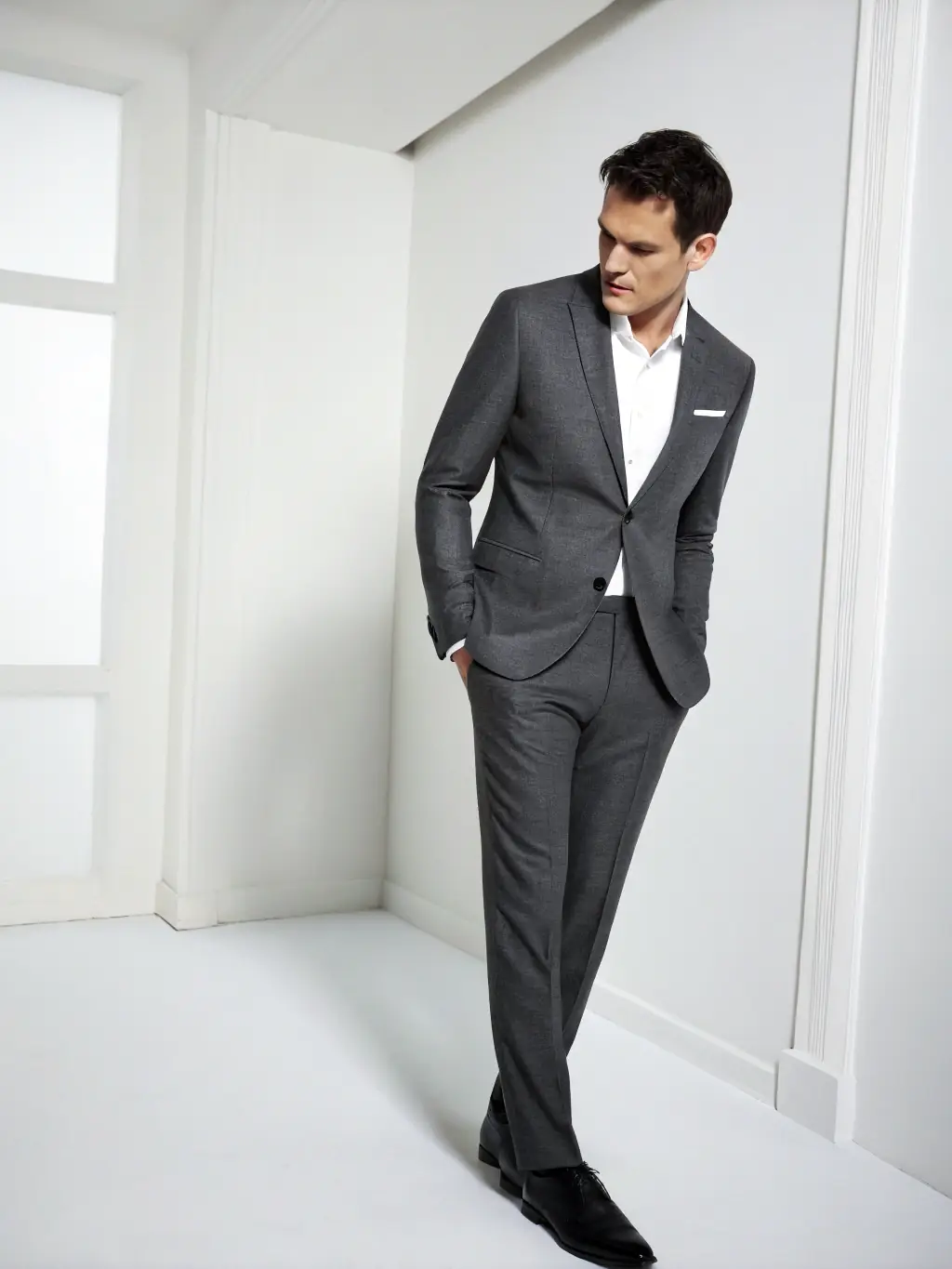 A professional headshot of a confident and successful-looking male model, representing the potential success members can achieve through the platform.